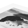 A close up of the white bevelled edge of this mounted print